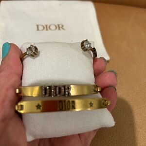Dior polished gold bracelet set.